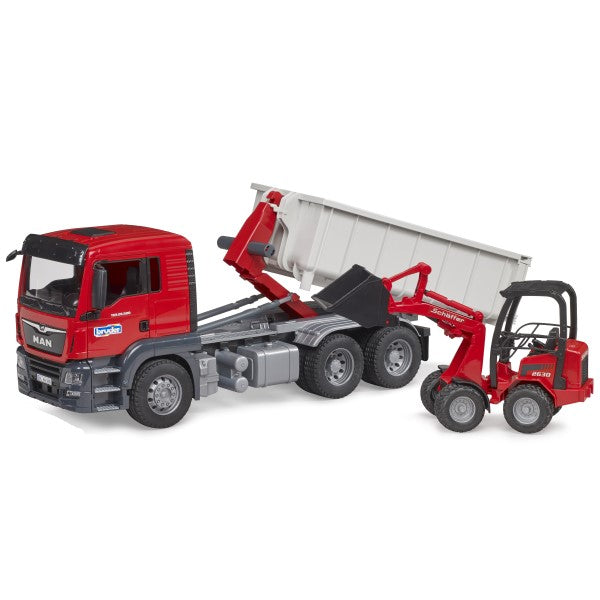 MAN TGS LKW mit Abrollcontainer und Schäffer Hoflader 2630