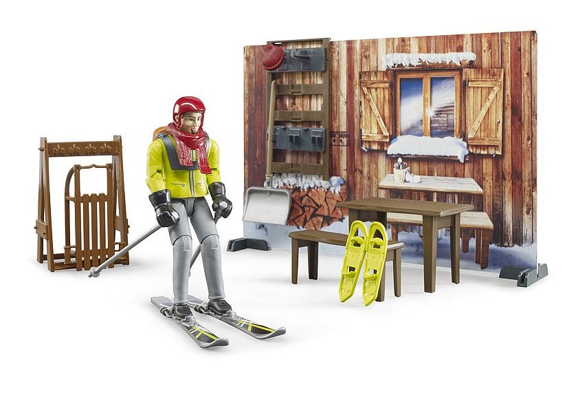 Berghütte mit Snowmobil