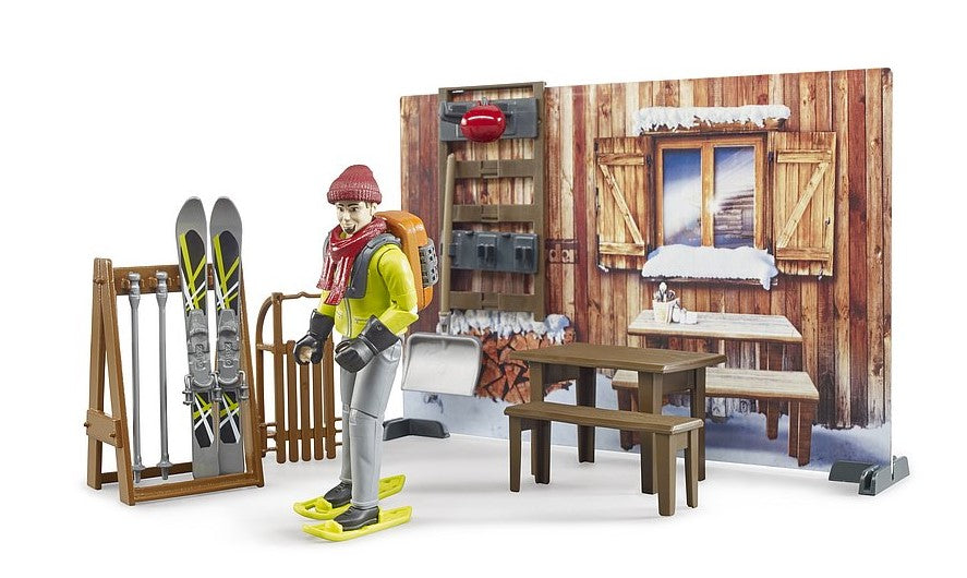 Berghütte mit Snowmobil