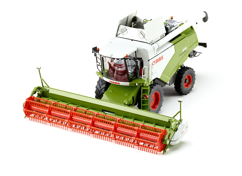Claas Tucano 570 Mähdrescher mit Getreidevorsatz
