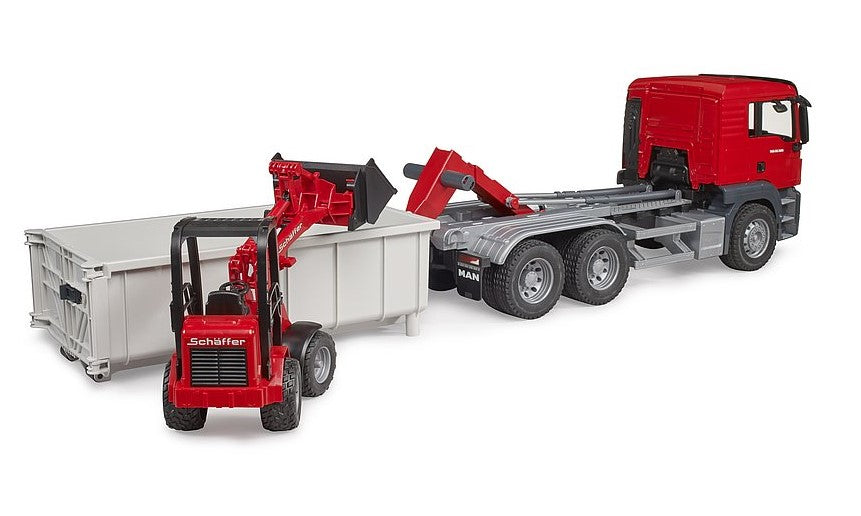 MAN TGS LKW mit Abrollcontainer und Schäffer Hoflader 2630