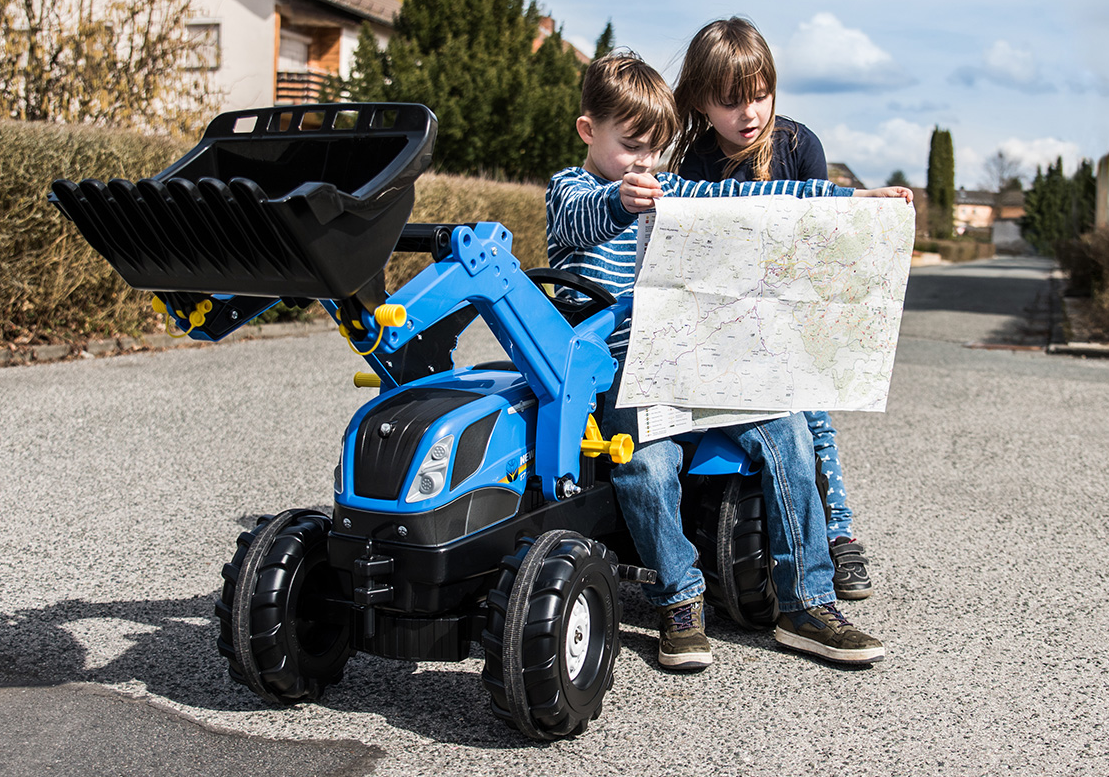 rollyFarmtrac New Holland mit rollyTrac Lader