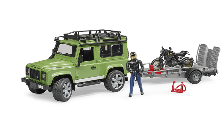Land Rover Station Wagon mit Anhänger