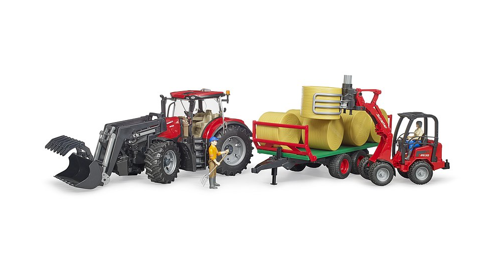 Case IH Optum 300 CVX mit Frontlader und Ballentransportanhänger