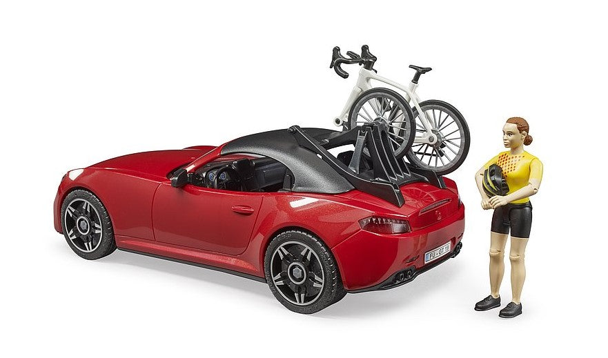 Bruder Roadster mit Rennrad und Radfahrerin