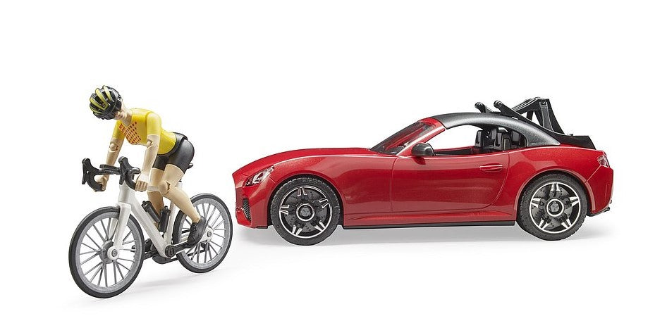 Bruder Roadster mit Rennrad und Radfahrerin