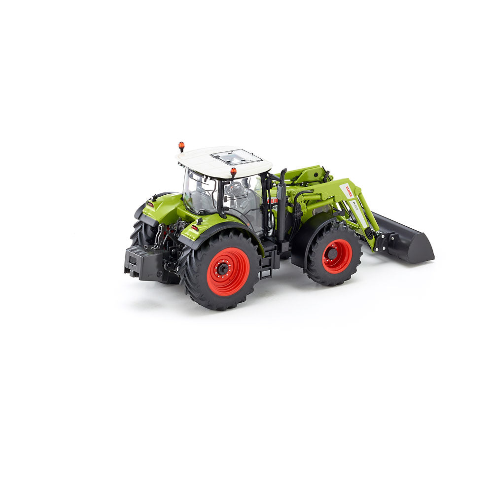 Claas Arion 650 mit Frontlader