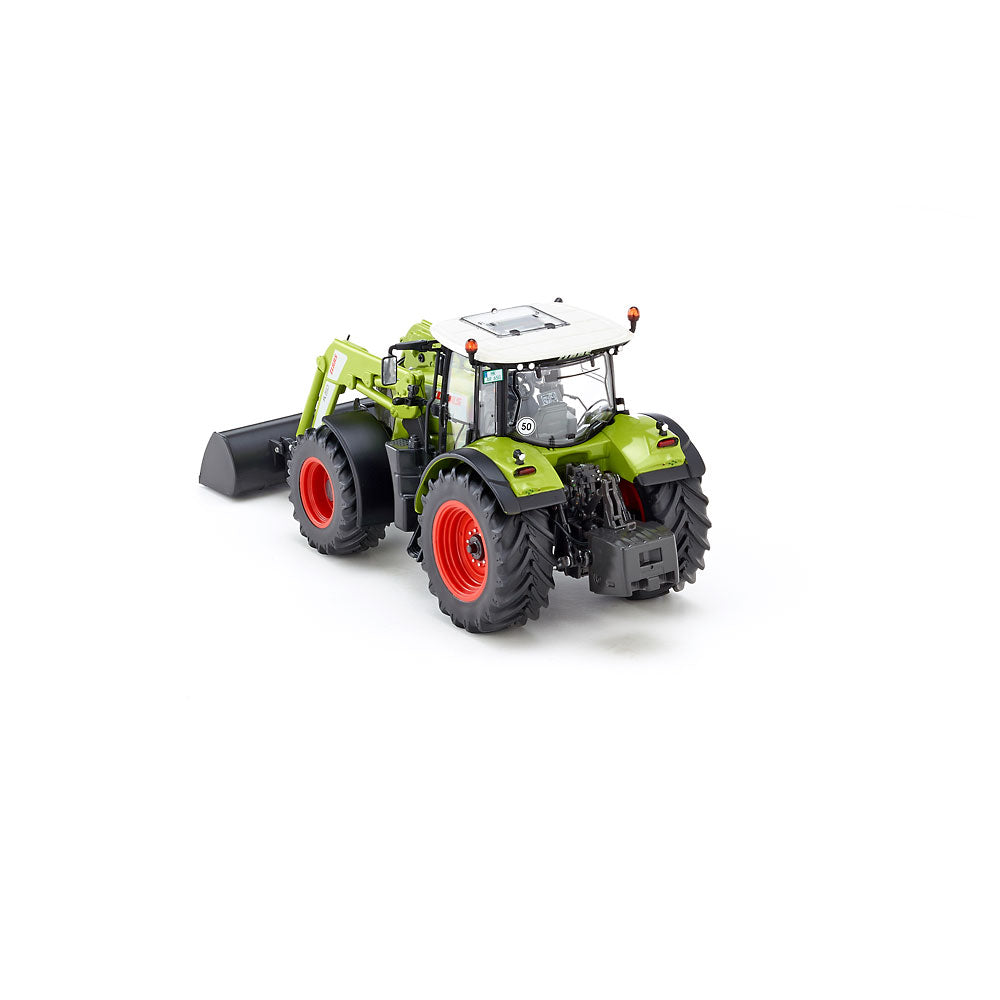 Claas Arion 650 mit Frontlader