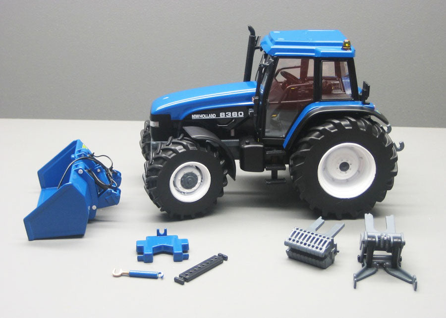 New Holland 8360 mit blauer Kippmulde