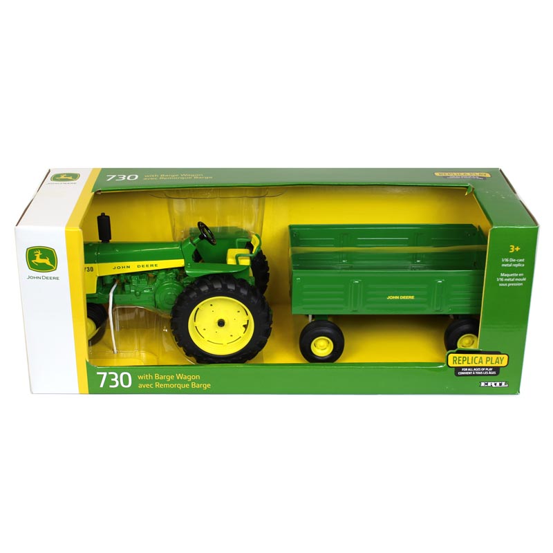 John Deere 730 mit Wagen