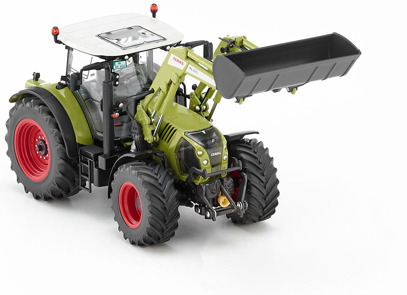 Claas Arion 650 mit Frontlader